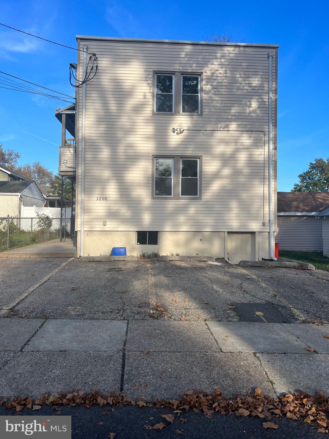 a view of a house with a road