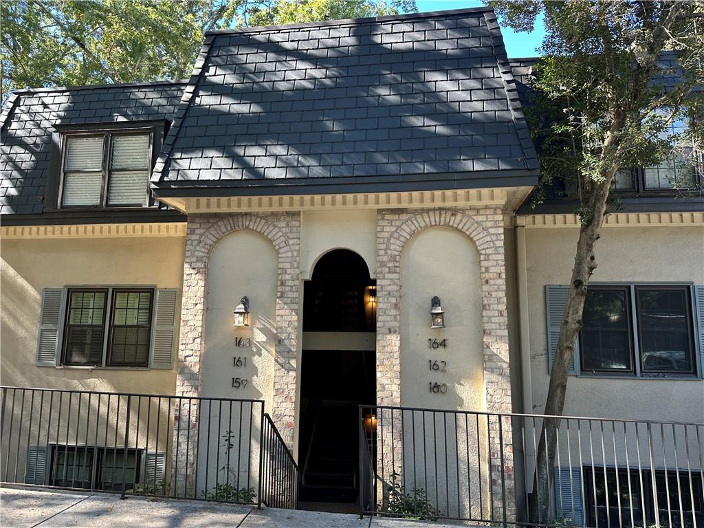 a front view of a house with a door