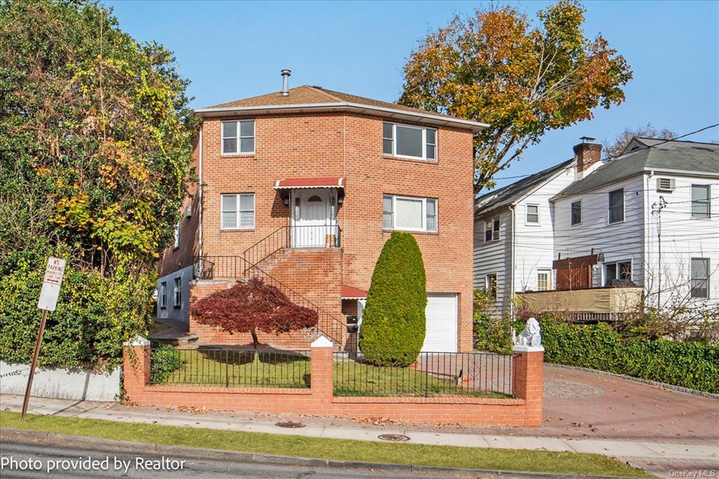 View of front of house featuring a garage