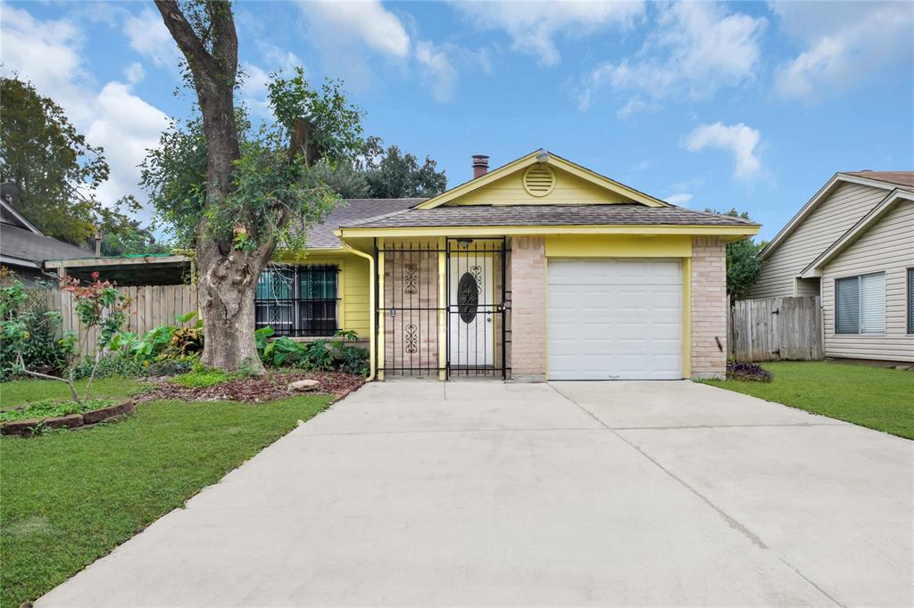 a front view of a house with yard