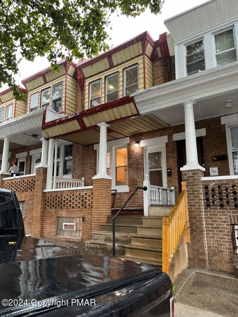 front view of a house with a porch