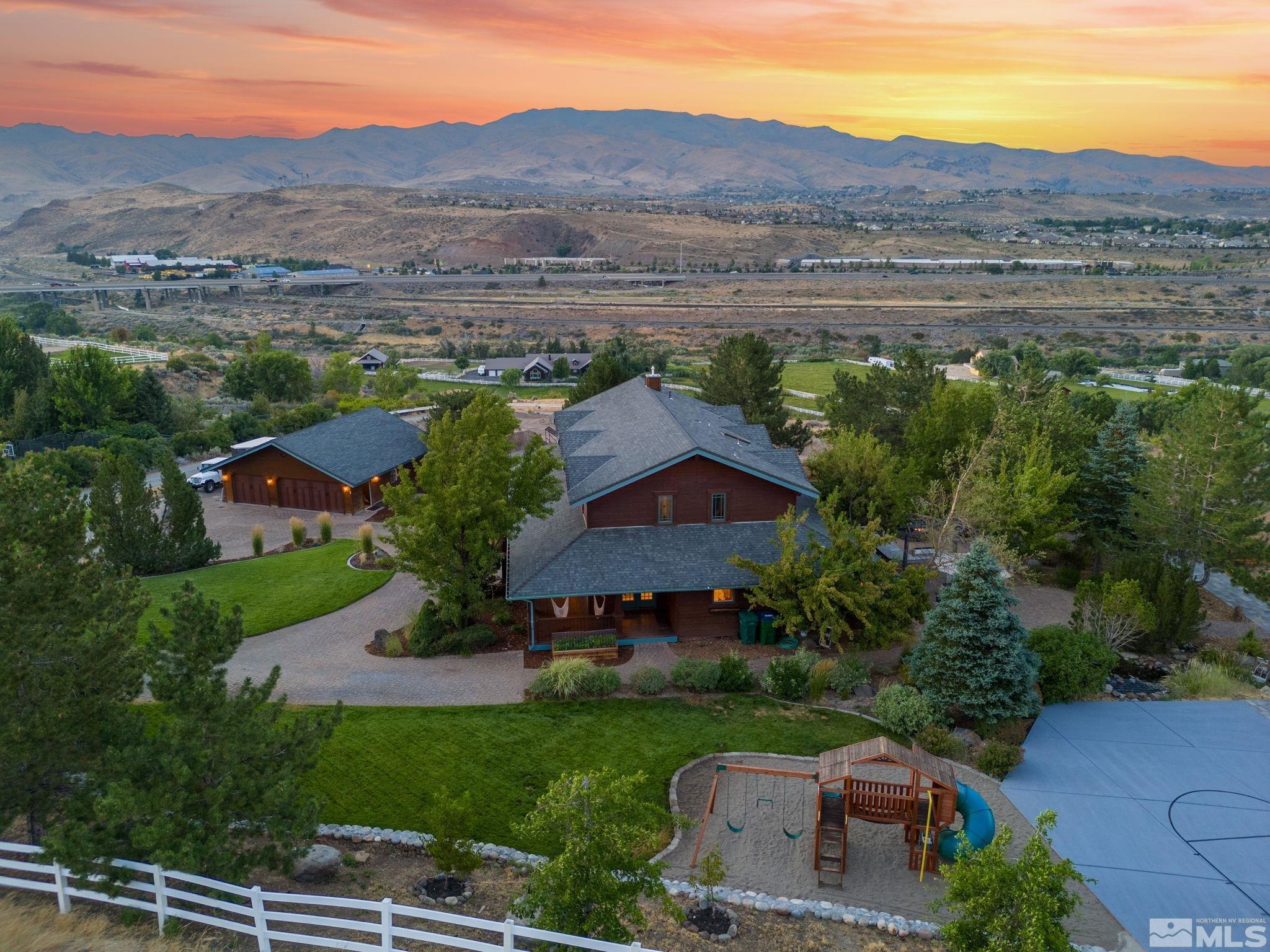 an aerial view of a house with a garden