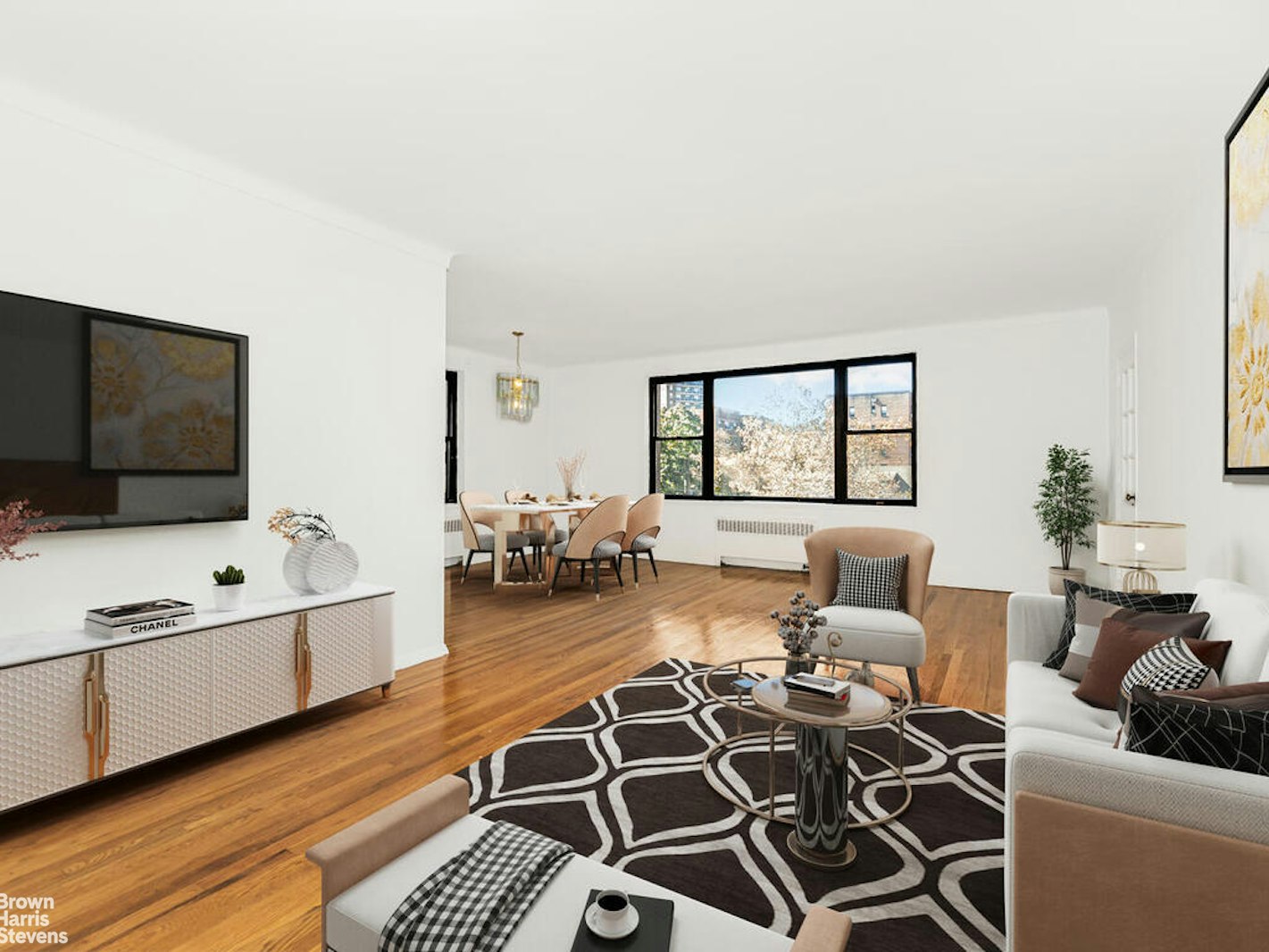 a living room with furniture and a flat screen tv