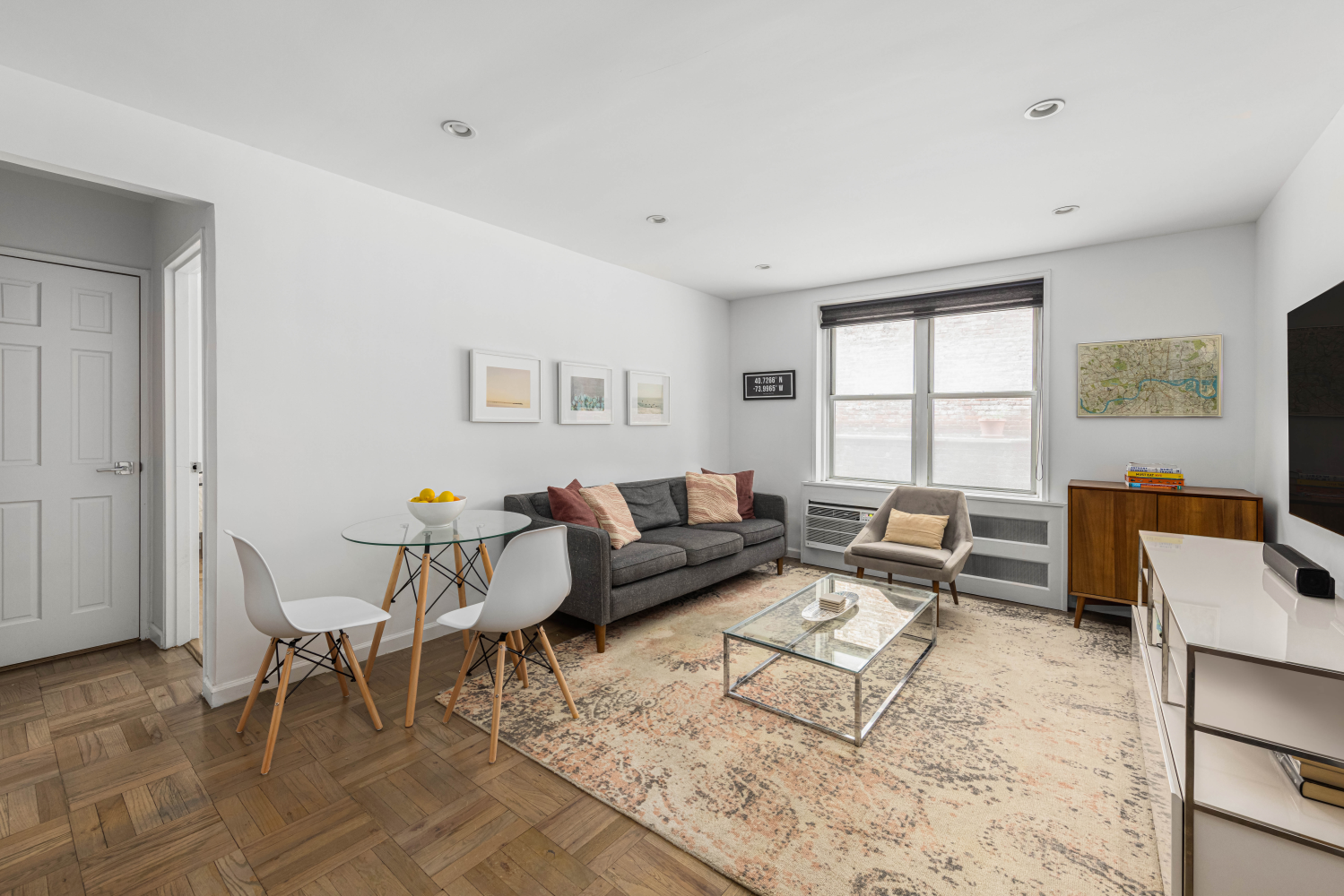 a living room with furniture and a window