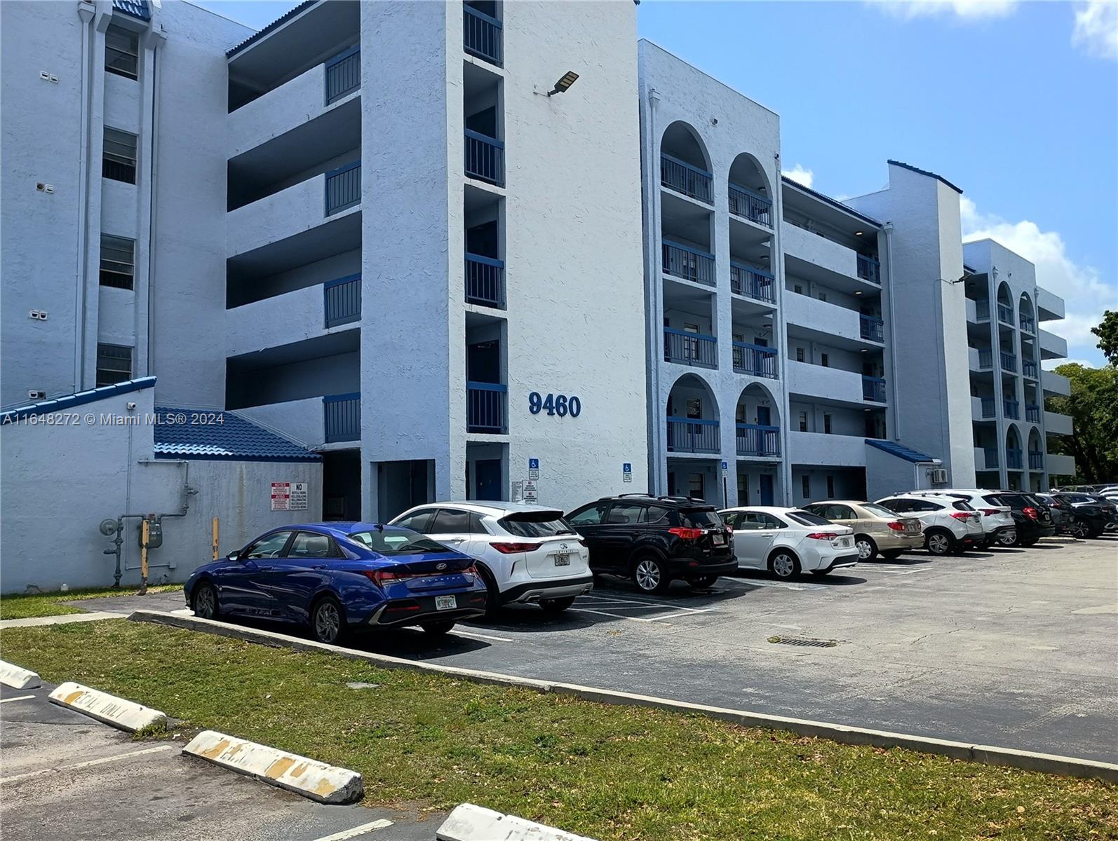 a cars parked in front of a building