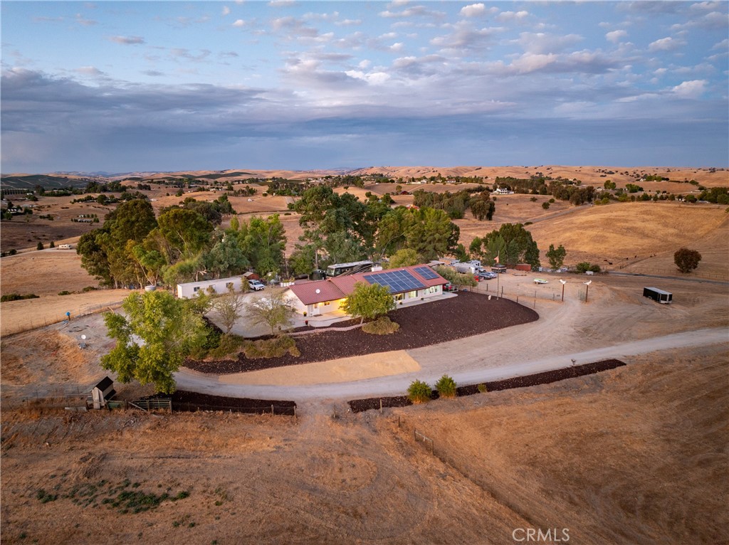 an aerial view of a houses and city view