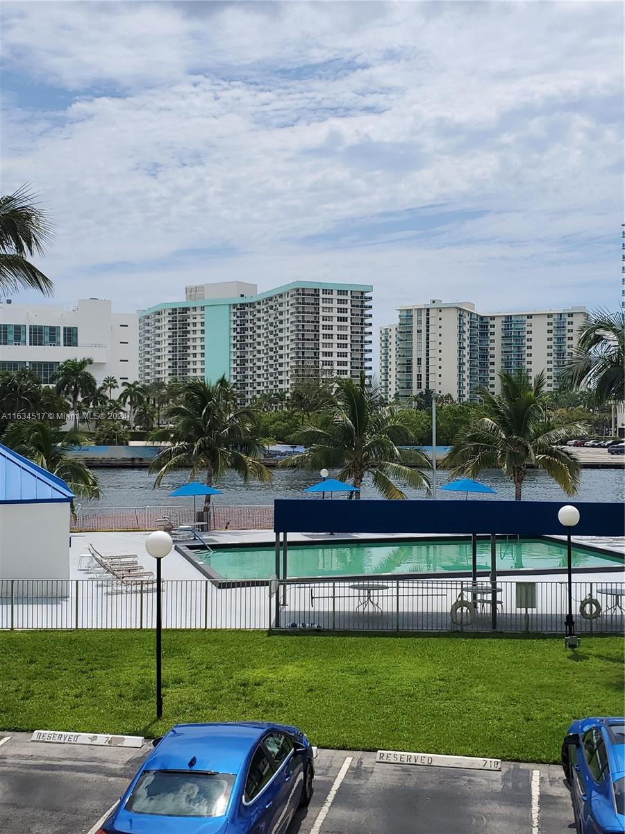 a view of a swimming pool with a patio