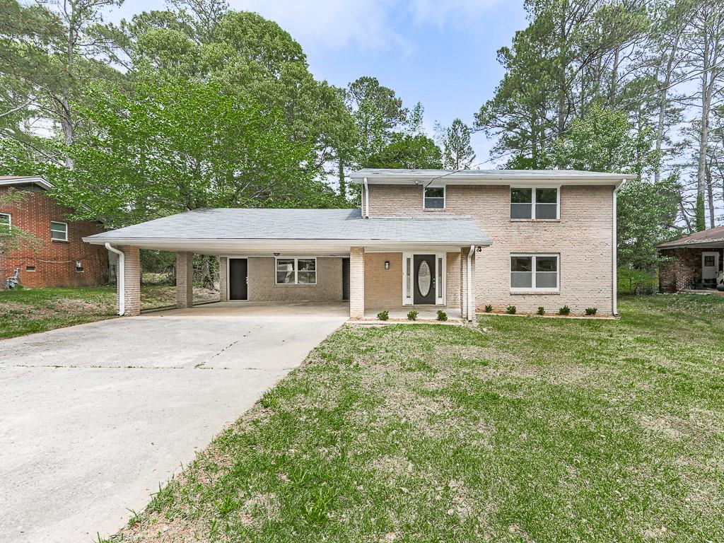 front view of a house with a yard