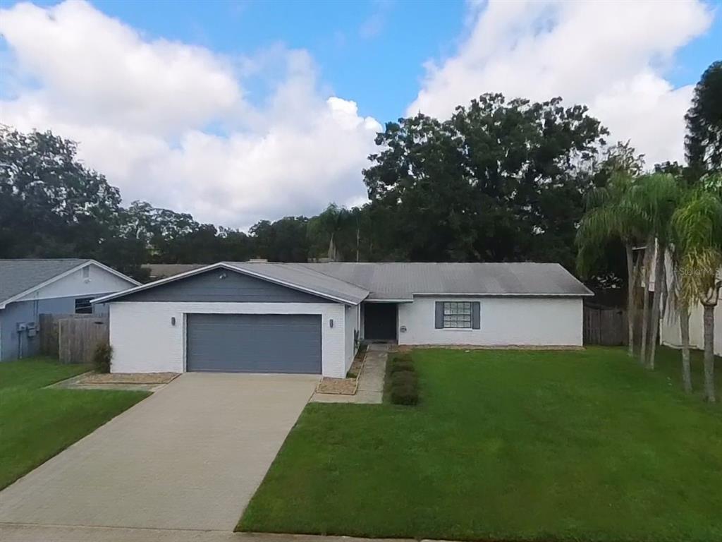 front view of a house and a yard