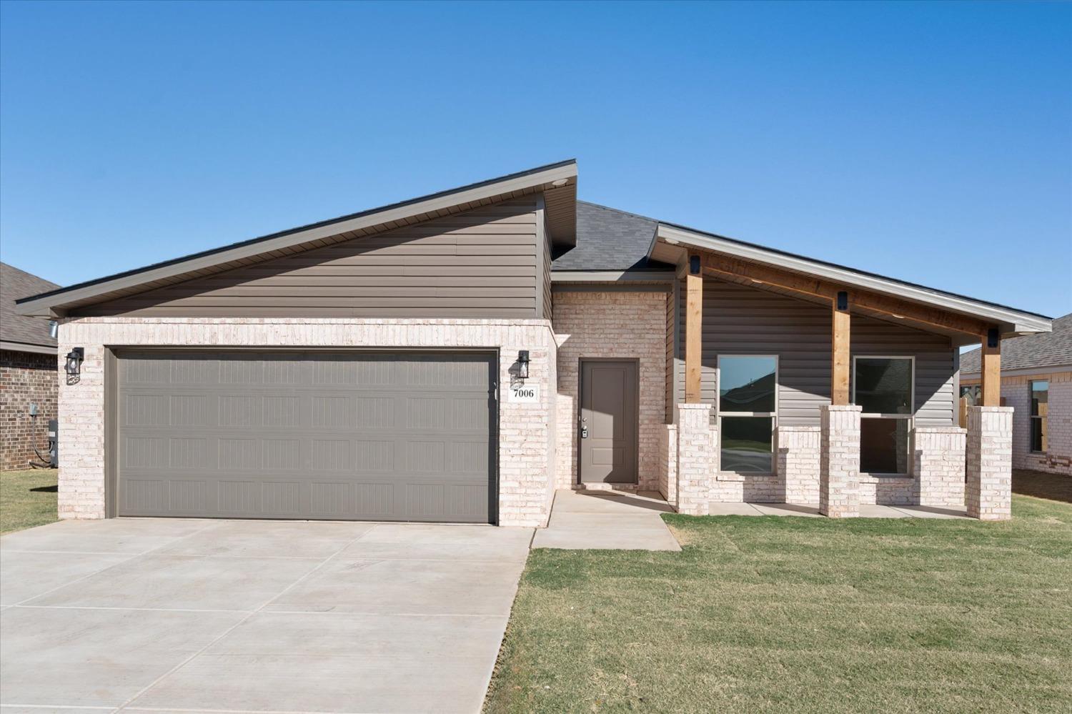 front view of a house with a garage