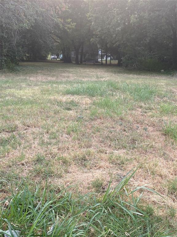 a view of an outdoor space and a yard