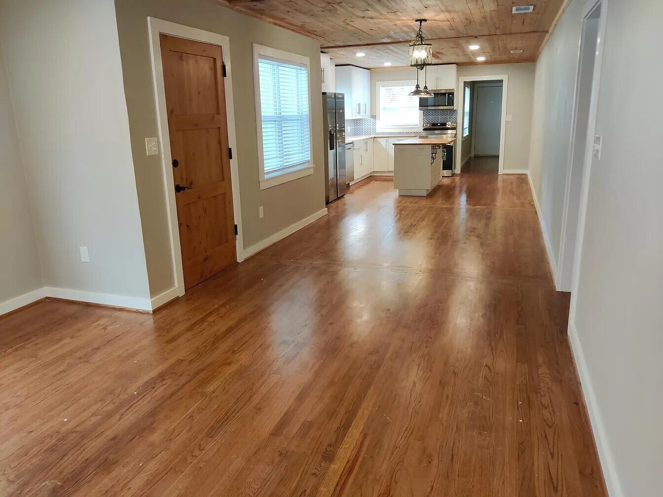 a view of kitchen with wooden floor