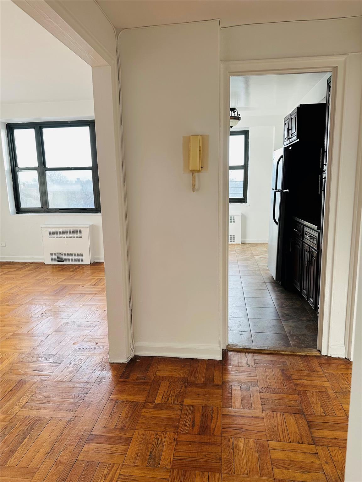 a view of livingroom and hardwood floor