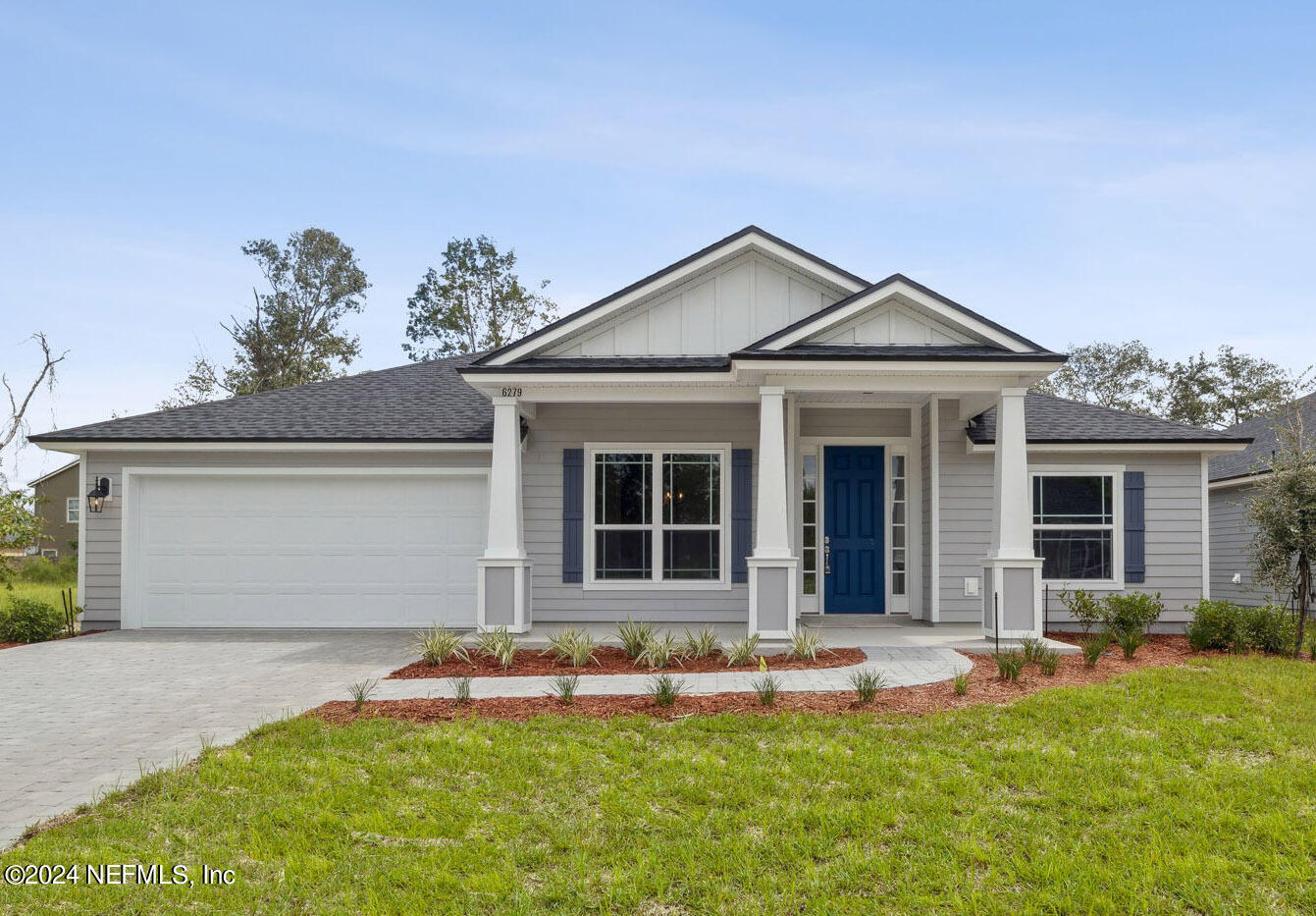 front view of a house with a patio