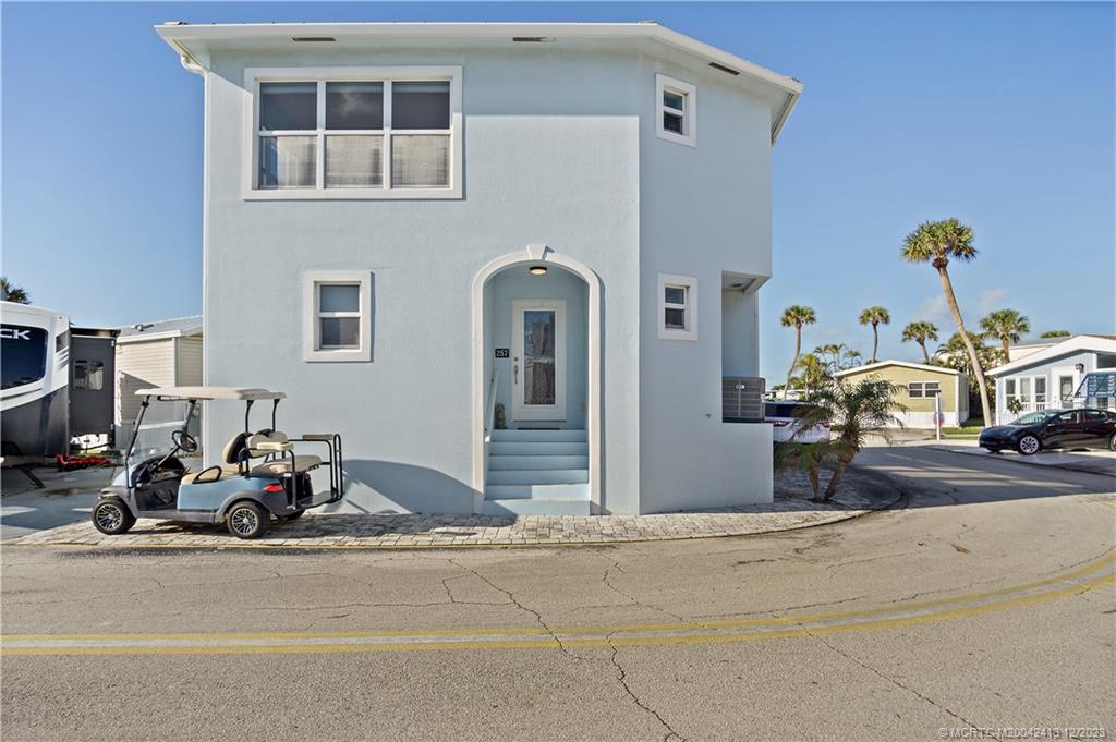 a front view of a house with a porch