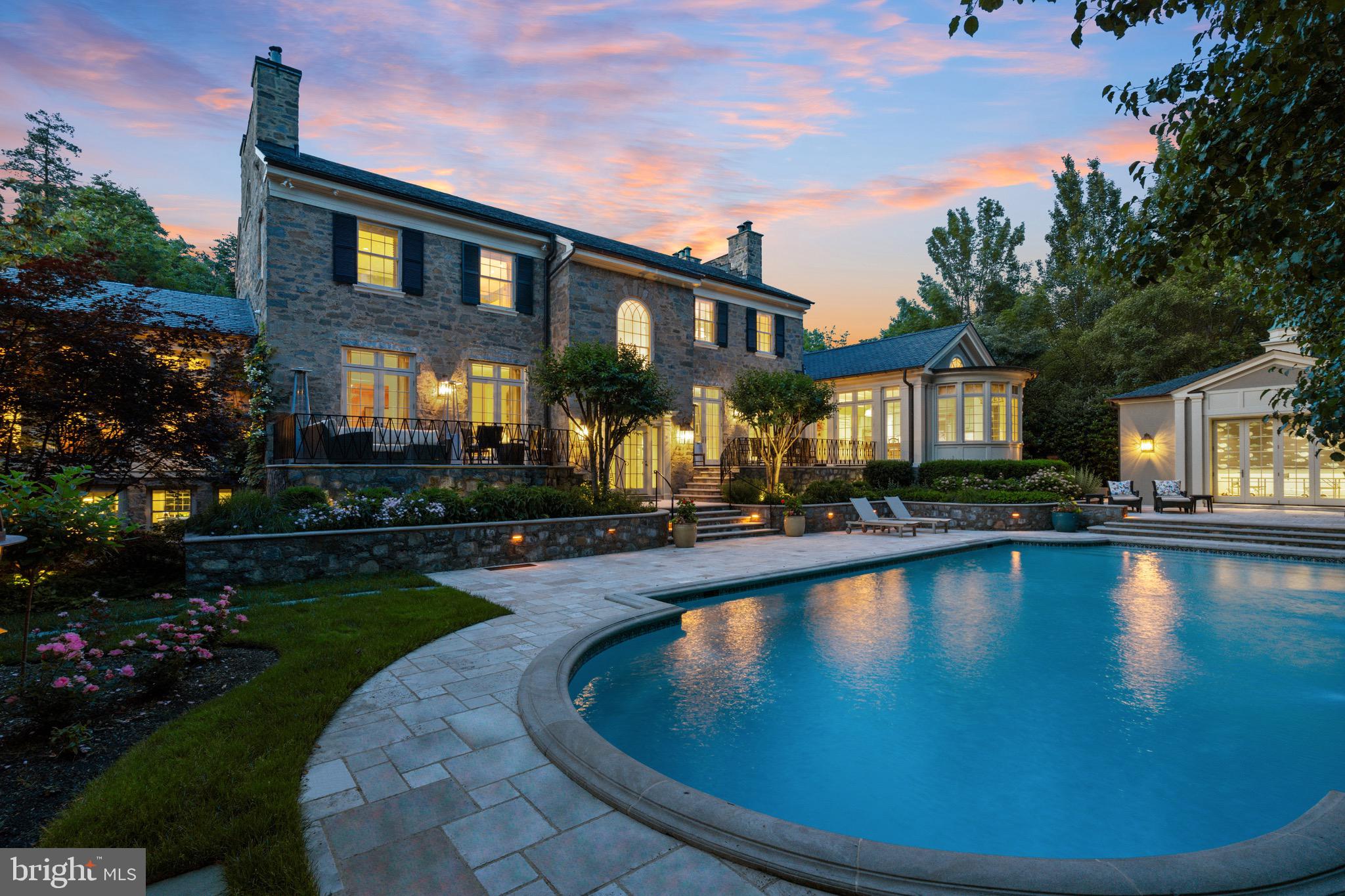 a view of a house with swimming pool