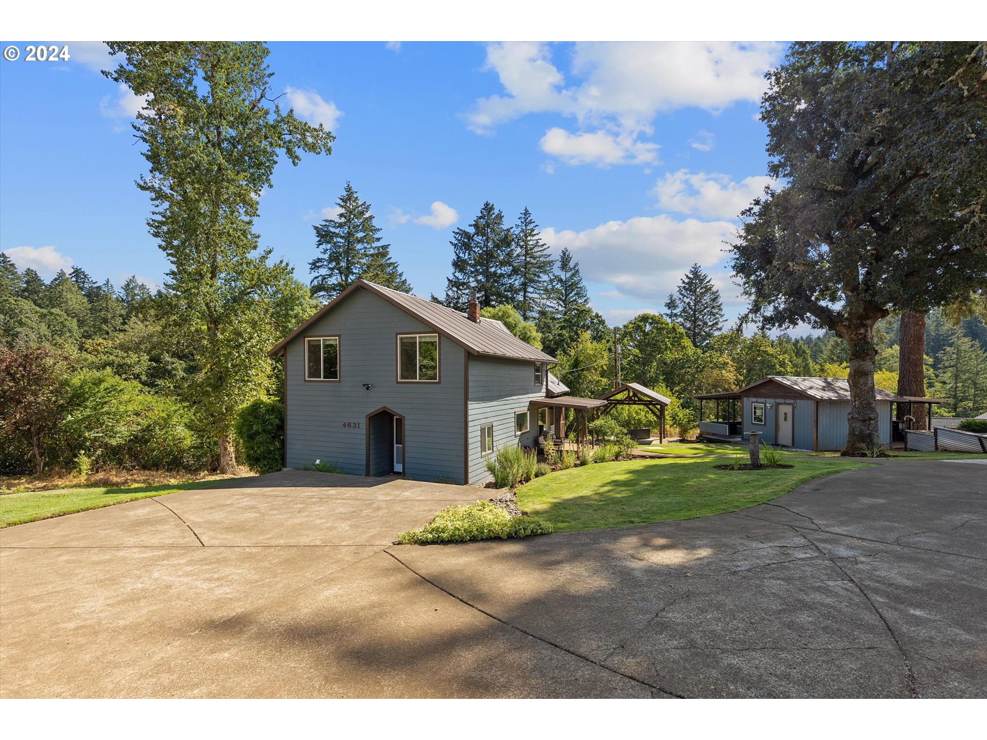 a house view with a backyard space