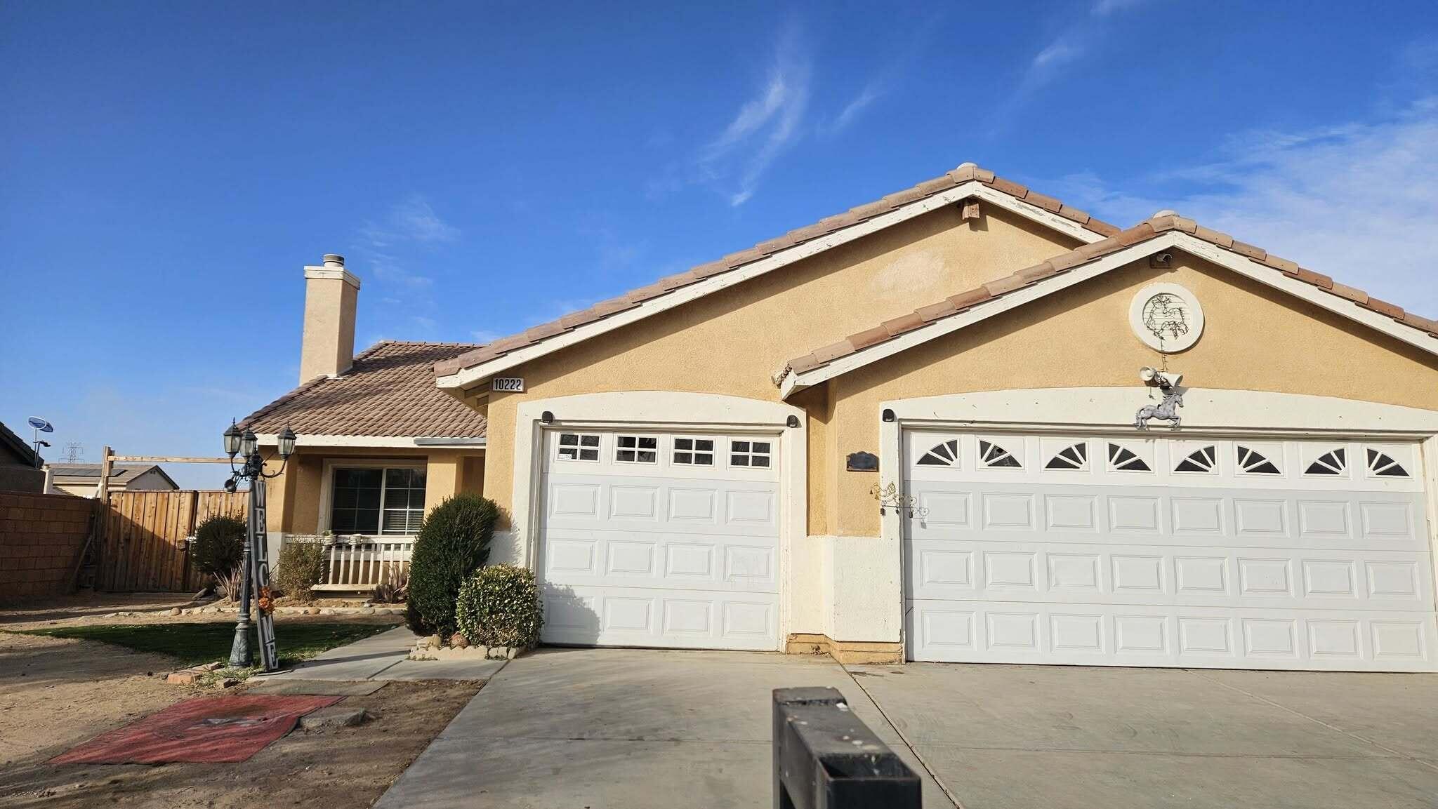 a view of a house with a garage