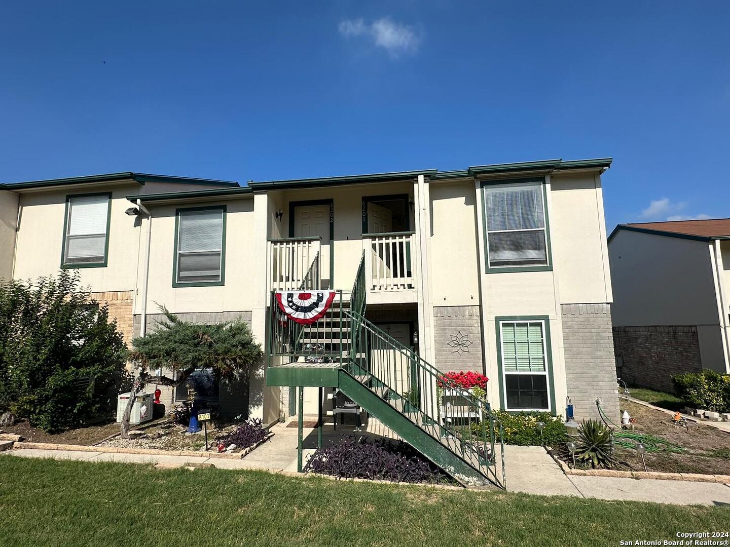 a front view of house with yard