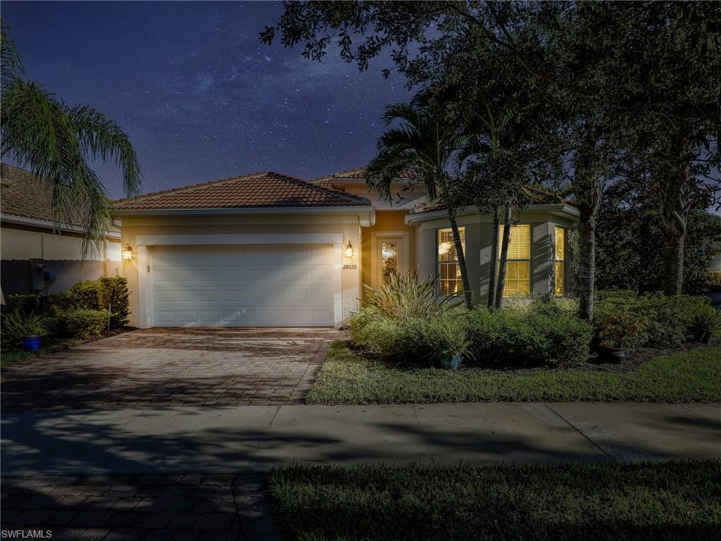 View of front of home with a garage