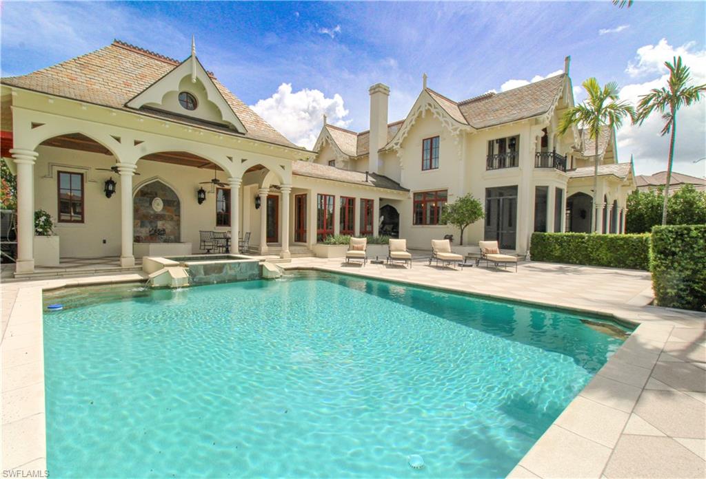 a front view of a house with swimming pool