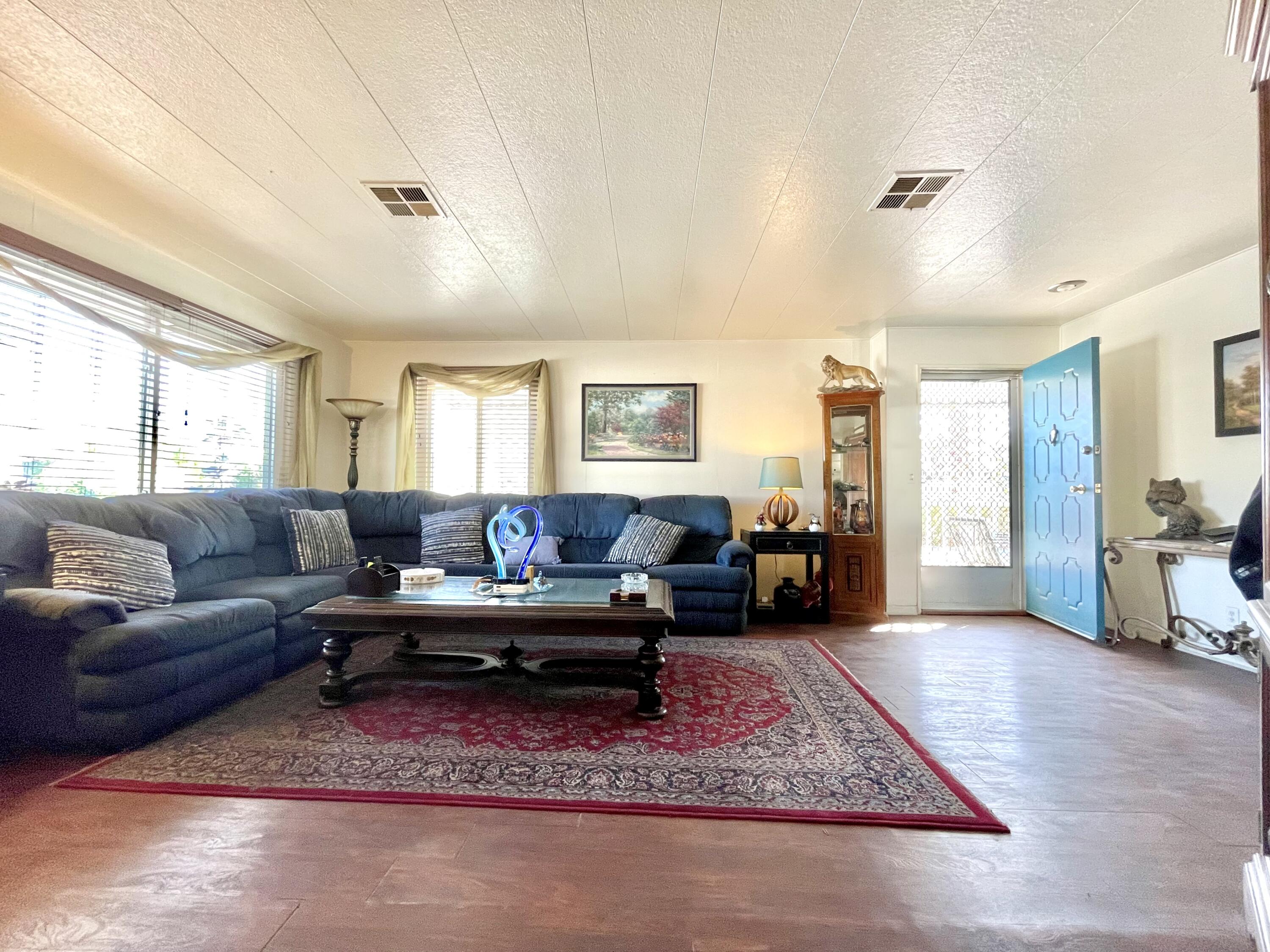 a living room with furniture and a couch