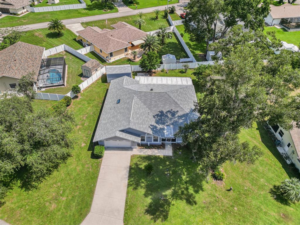 an aerial view of a house with a garden