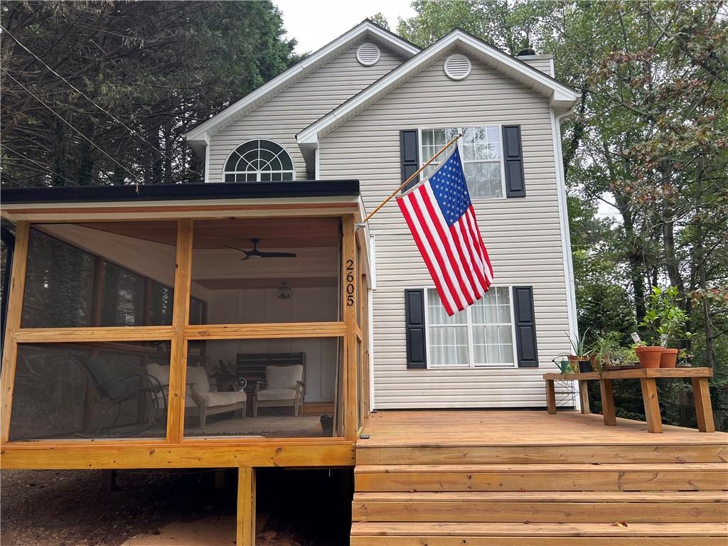 a view of outdoor space and front view of a house