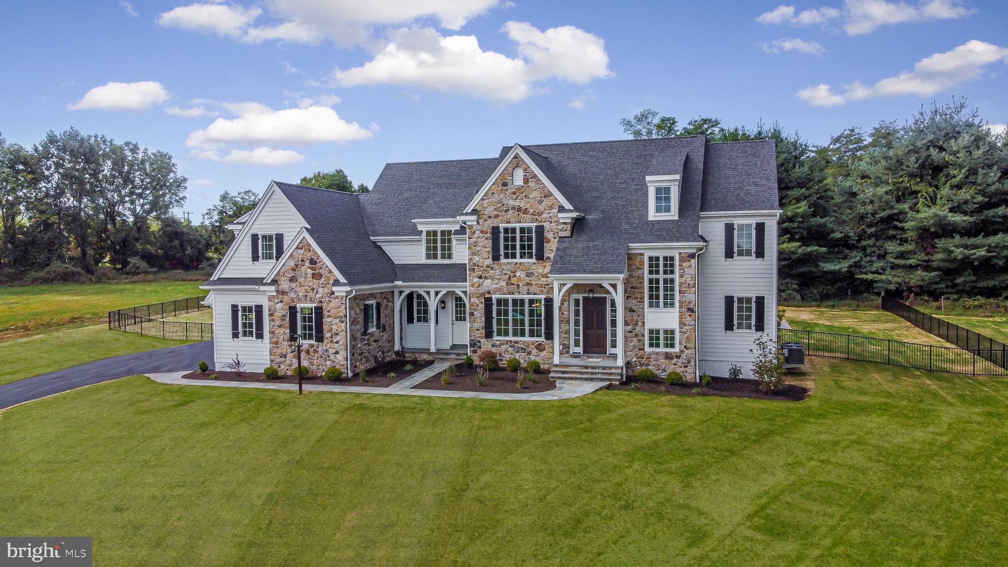 front view of a house with a small yard