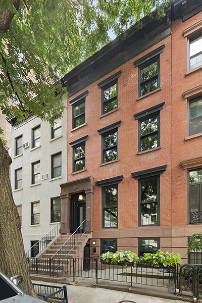 a front view of a multi story residential apartment buildings