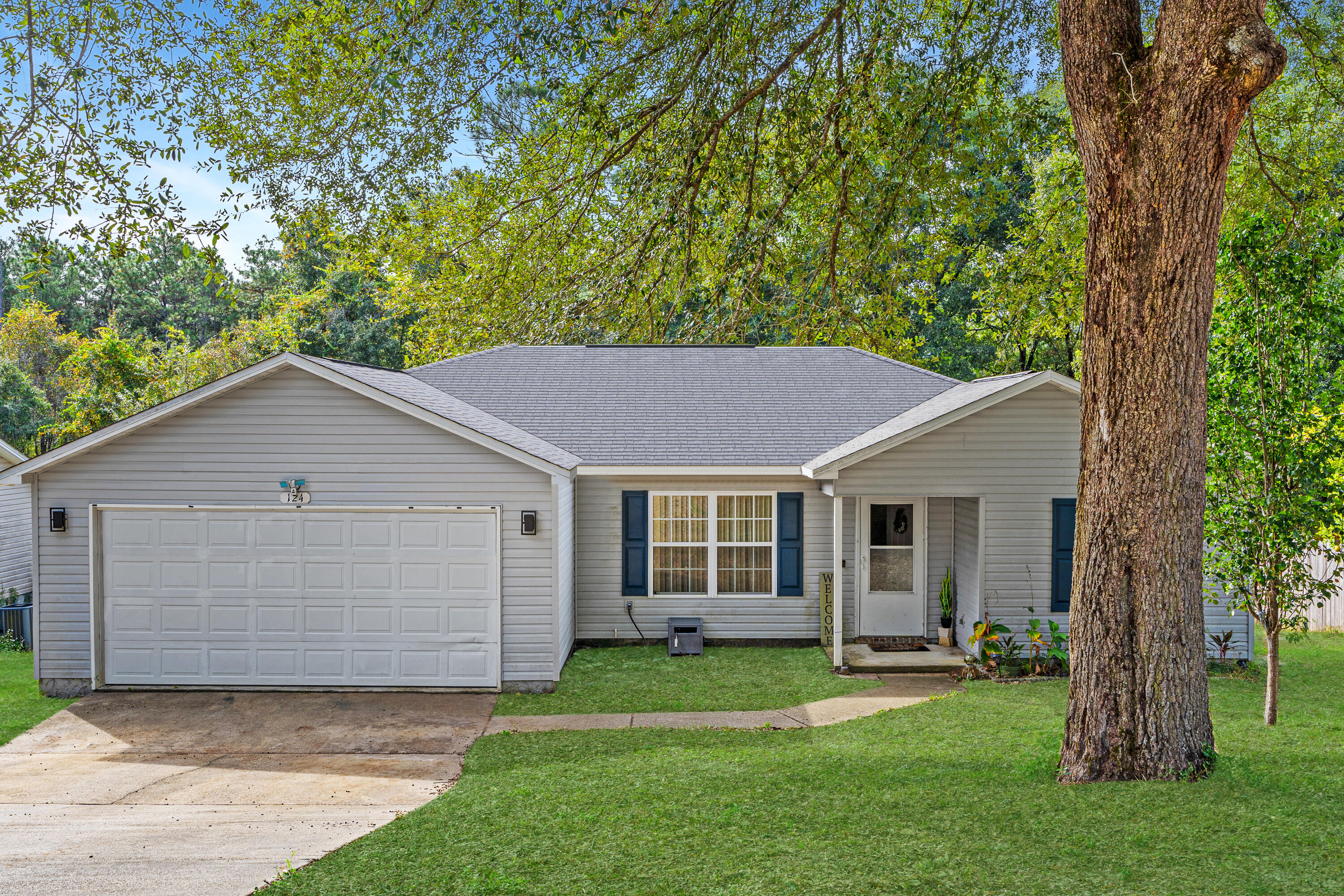 front view of a house and a yard