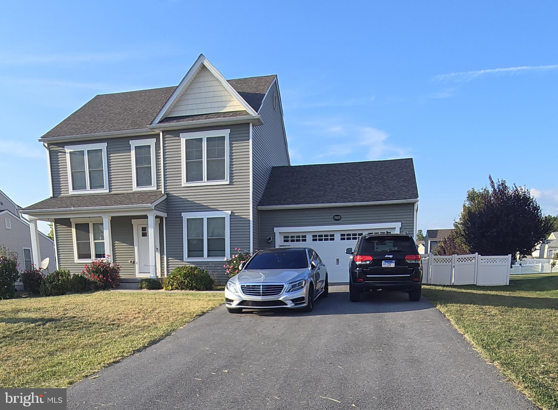 a car parked in front of a house