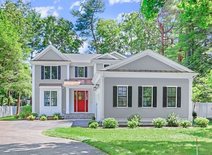 front view of a house with a yard