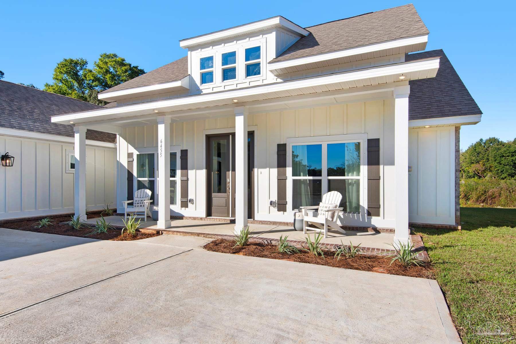 a front view of a house with a patio