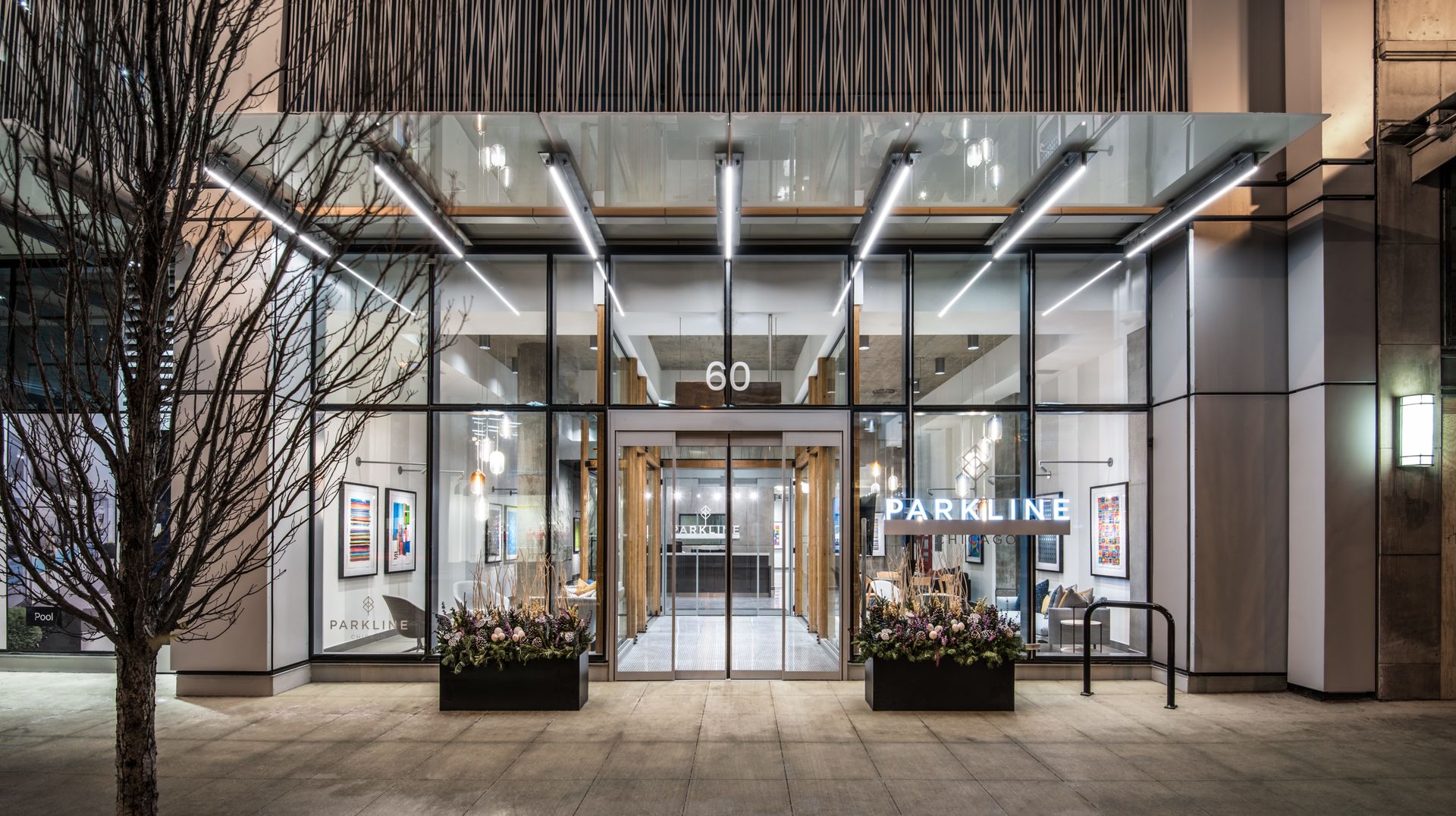 a building with glass top table and chairs