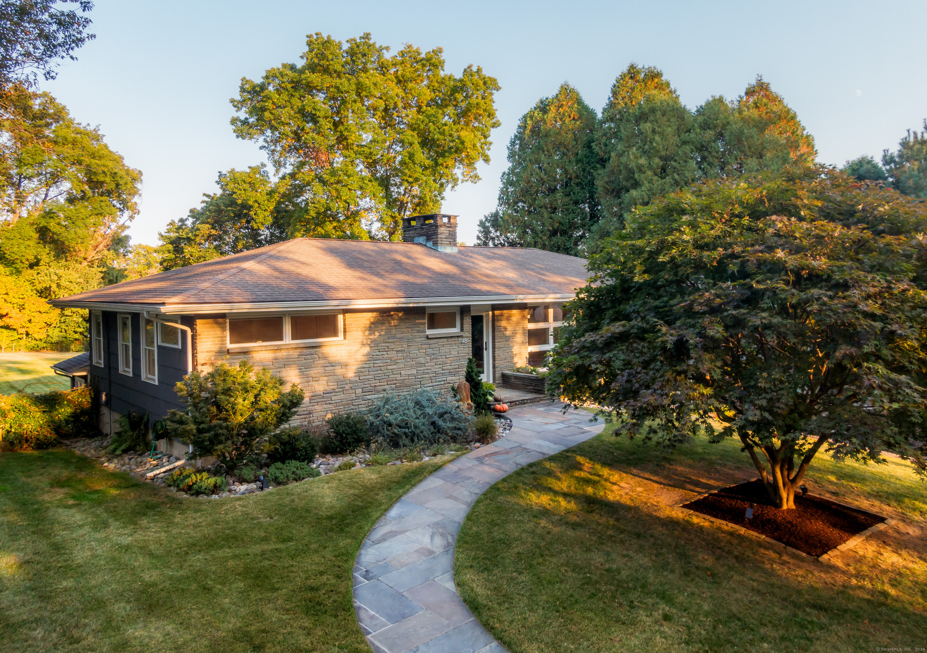 a view of a house with garden