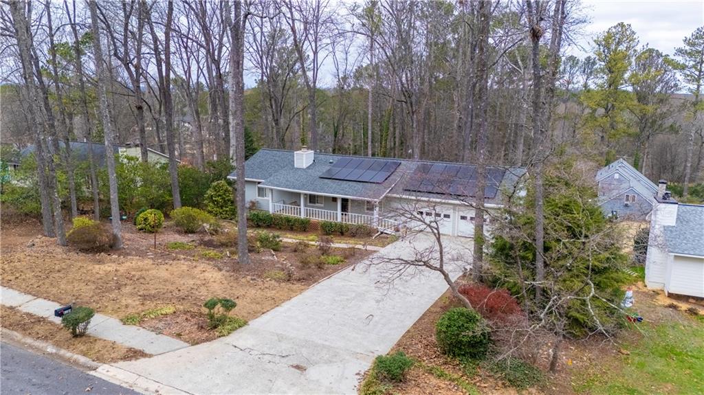 a view of a house with a yard