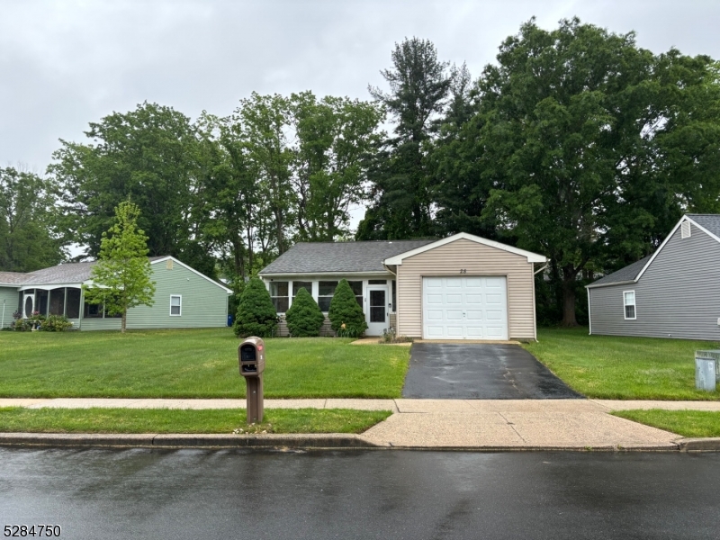 a house with trees in the background