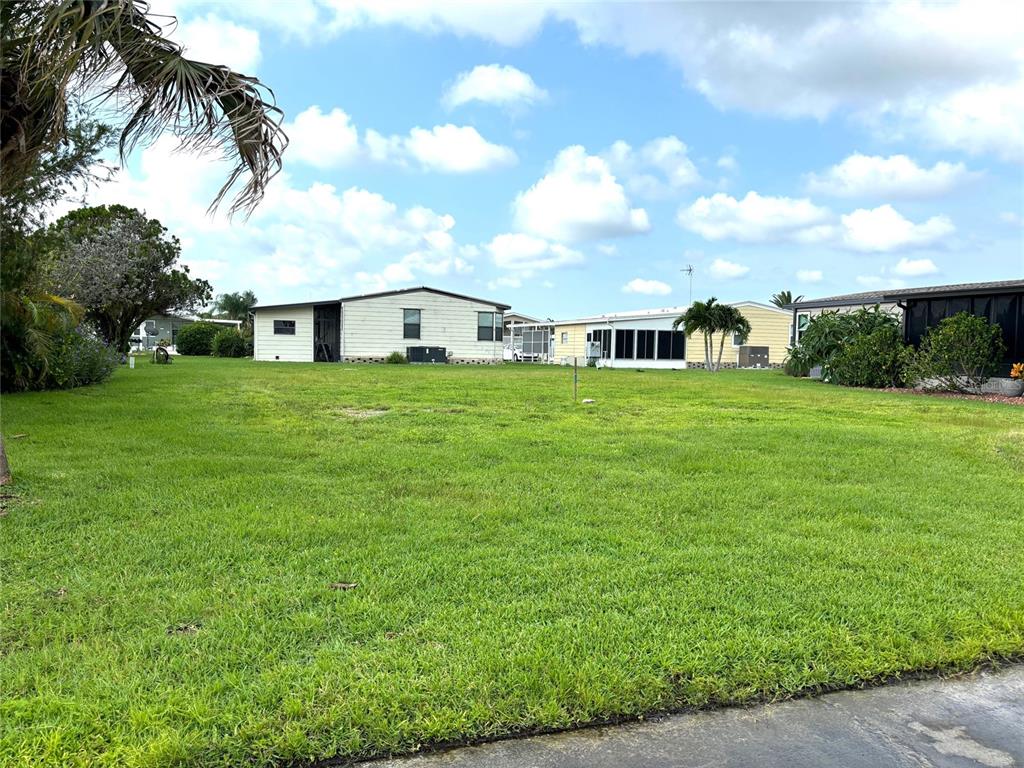 a view of a house with a big yard