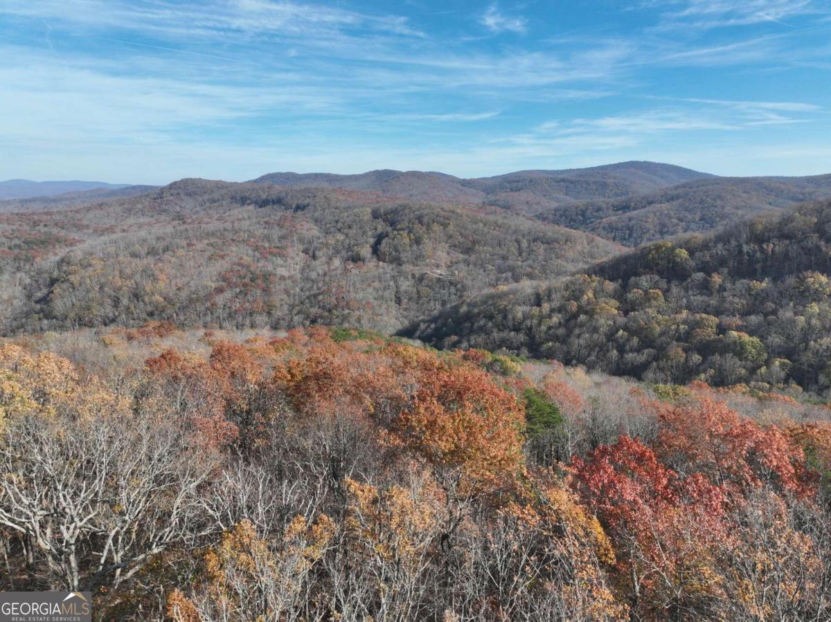 a view of mountains and valleys