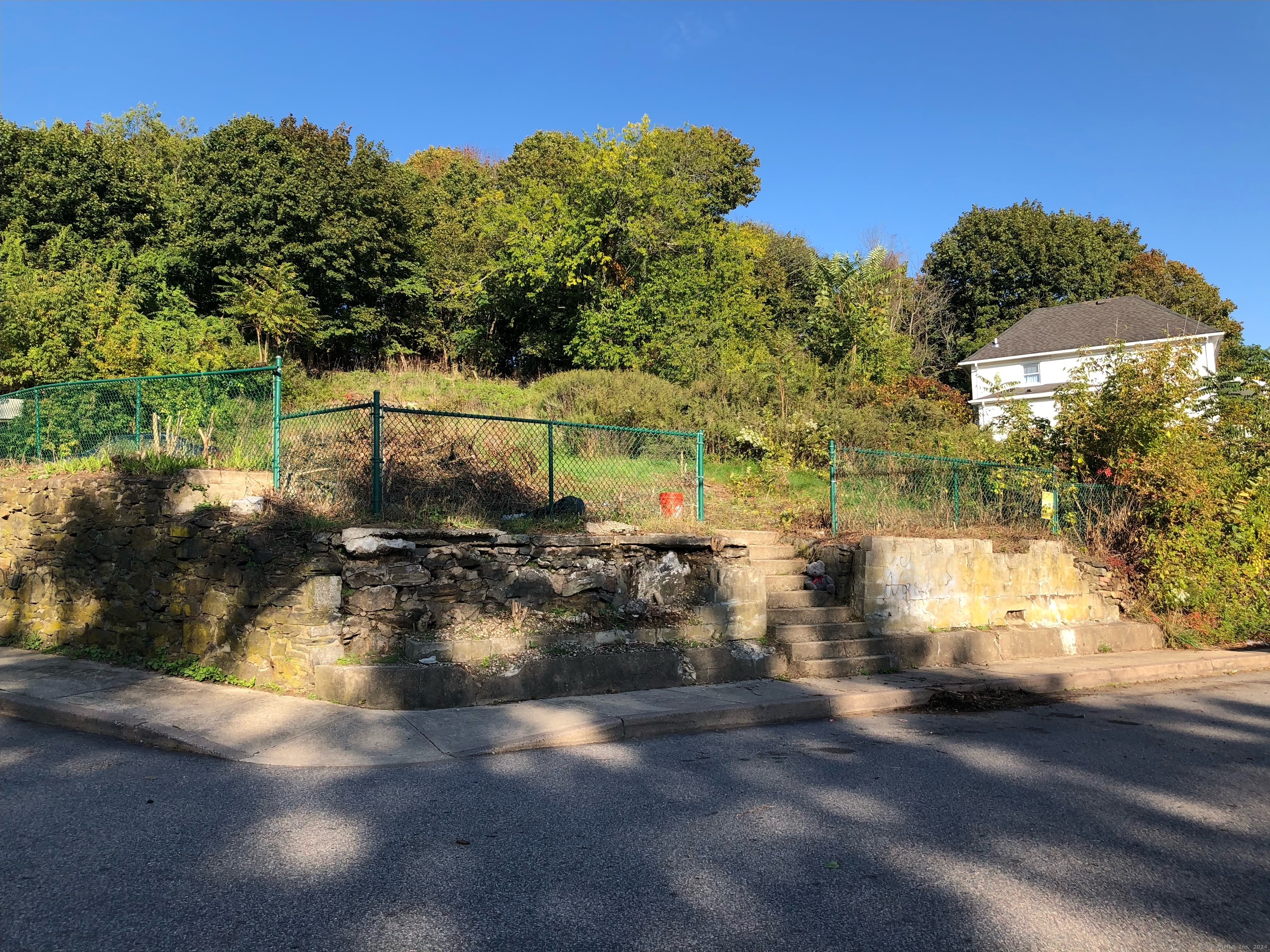 a view of a water fountain in a yard