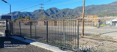 a view of a wrought iron fences in front of house