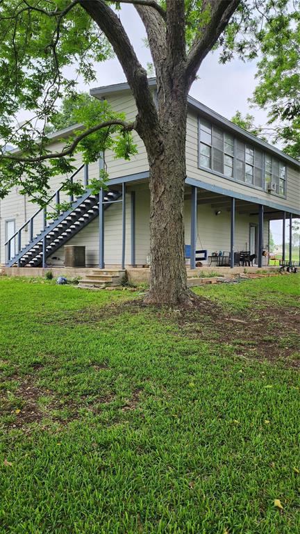 a house view with a garden space