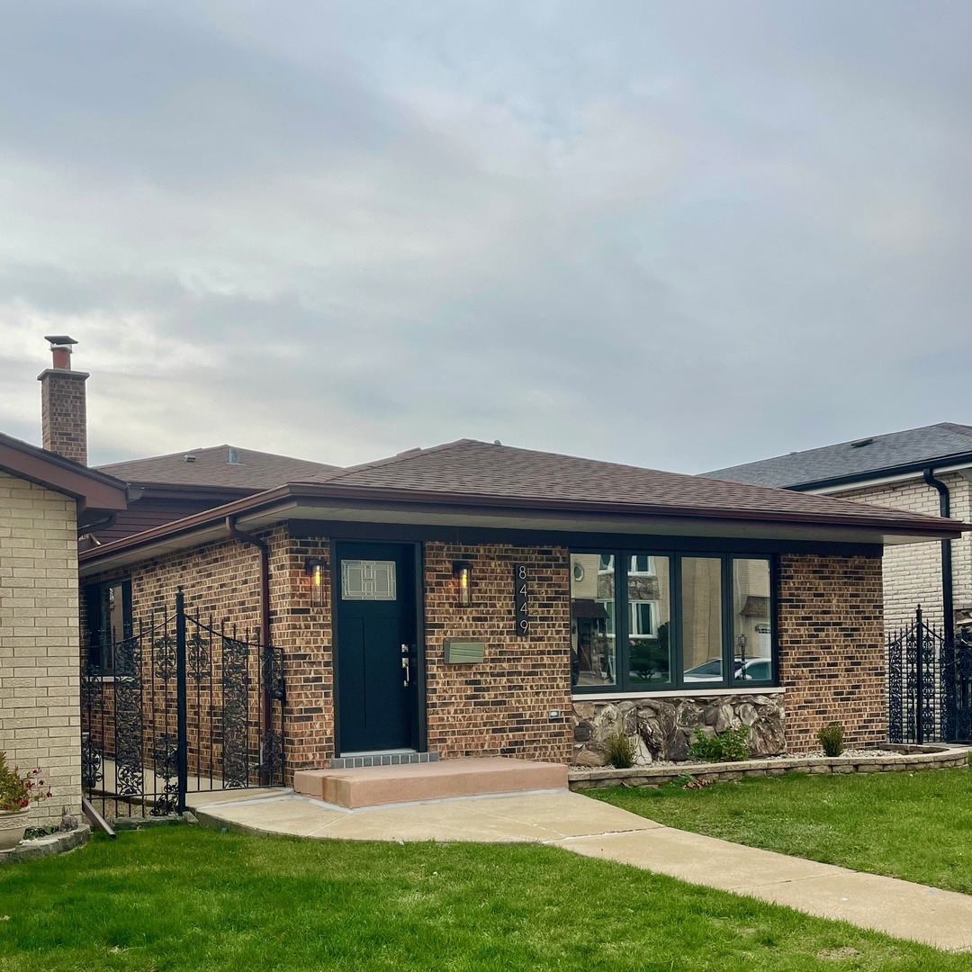 front view of house with a yard