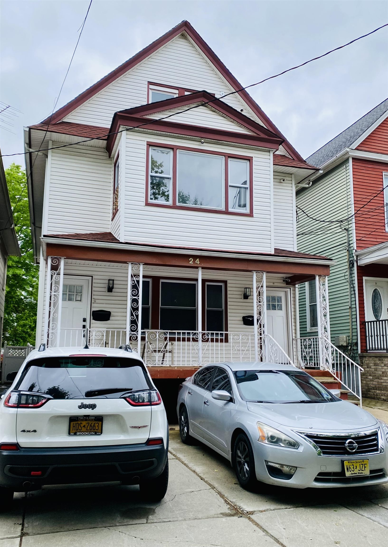 a car parked in front of a house