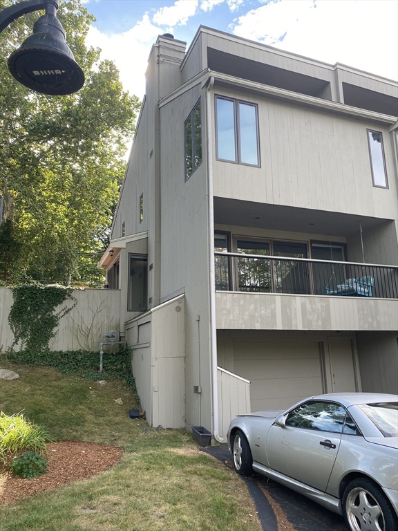 a car parked in front of a house