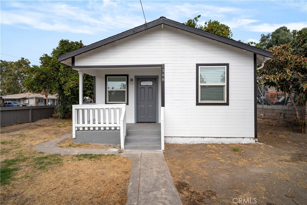 a front view of a house with porch