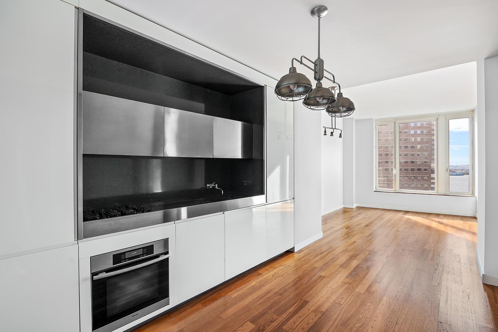 a kitchen with a stove and a microwave