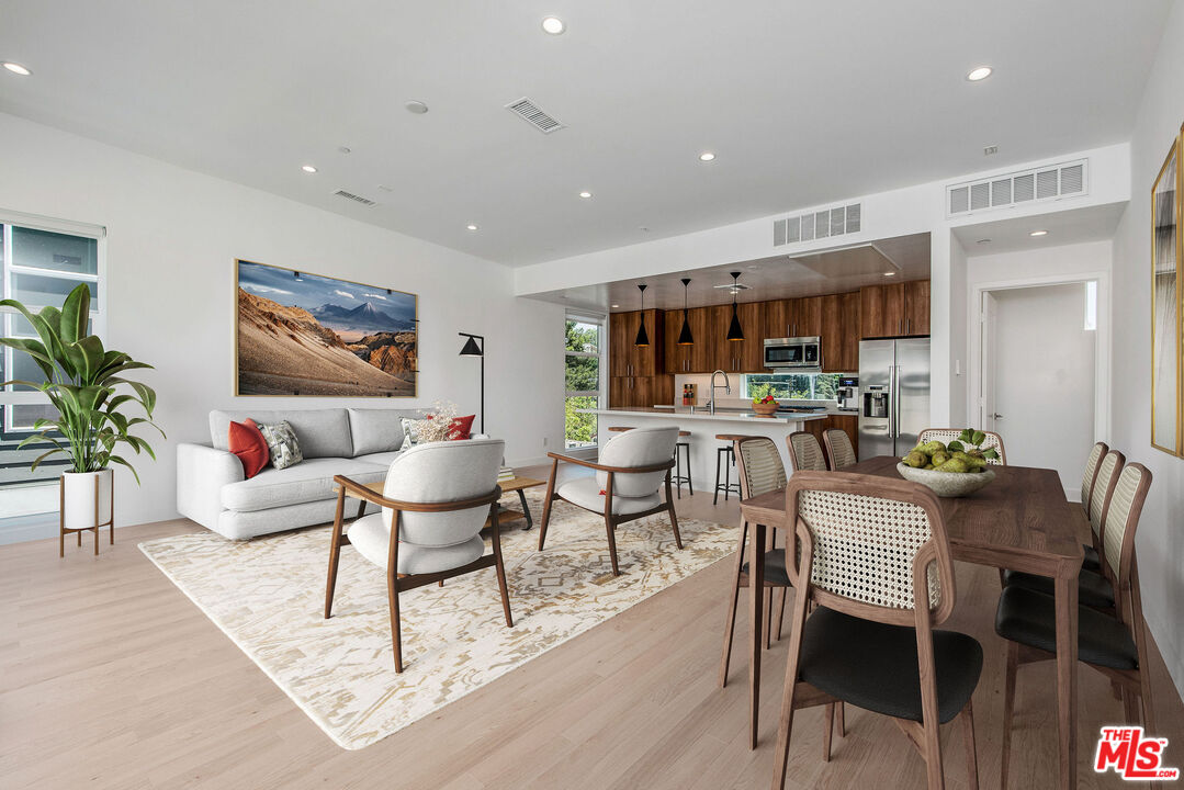 a view of a dining room with furniture