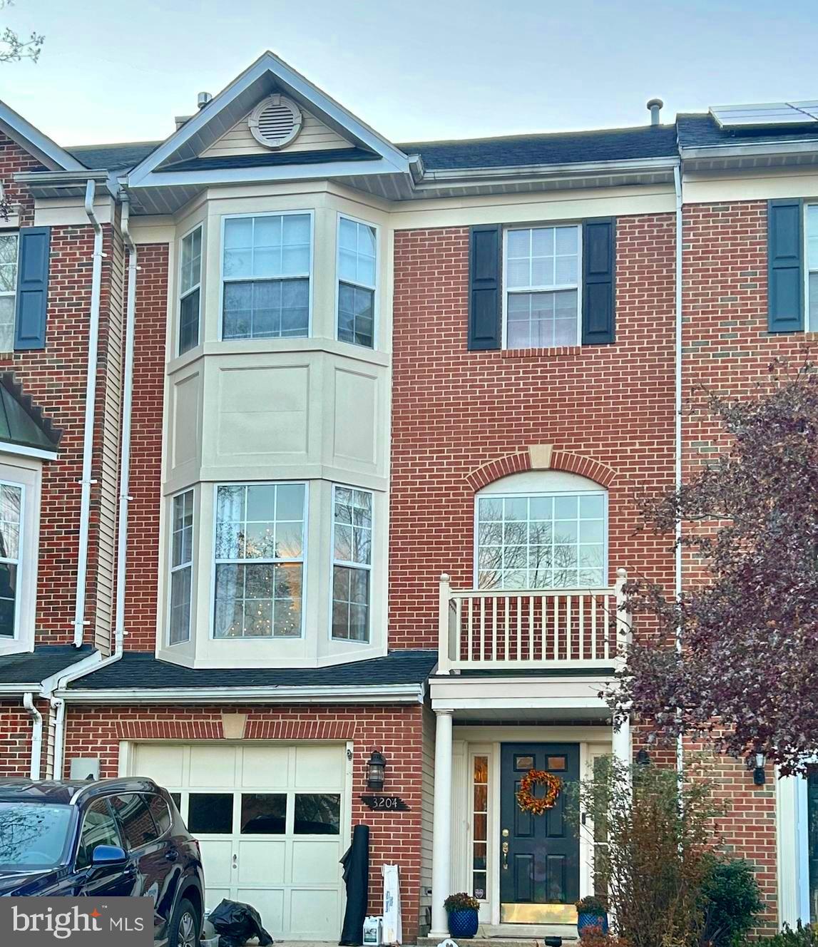 a front view of a residential apartment building with a door